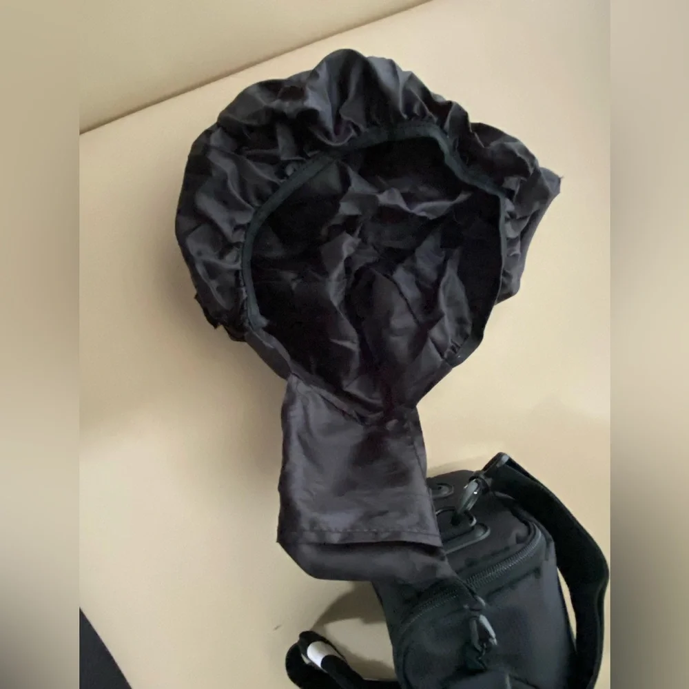NWOT- padded camera bag w/ camera rain cover.
